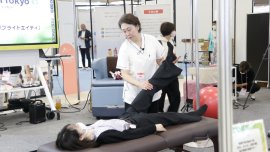 One of the exhibition areas at Femtech Tokyo 2023, where a visitor was able to go through a demonstration of a femtech service